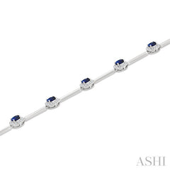 4x3 MM Oval Cut Sapphire and 1/2 Ctw Round Cut Diamond Halo Precious Bar Link Bracelet in 10K White Gold