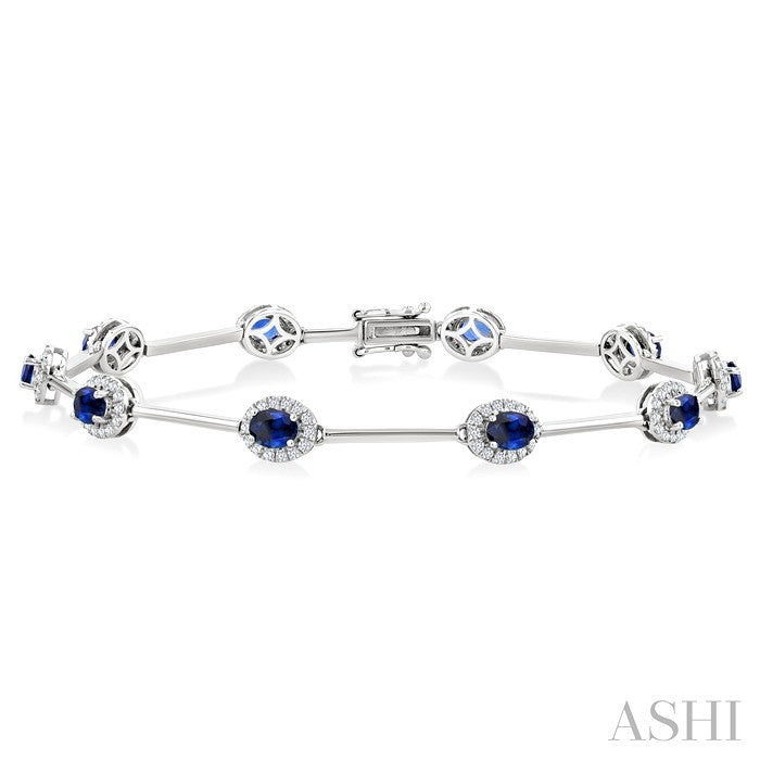 4x3 MM Oval Cut Sapphire and 1/2 Ctw Round Cut Diamond Halo Precious Bar Link Bracelet in 10K White Gold