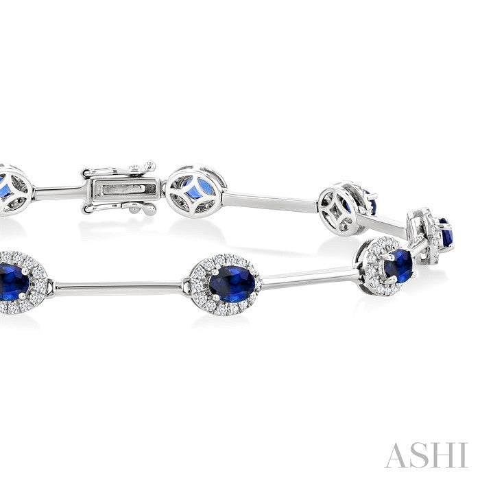 4x3 MM Oval Cut Sapphire and 1/2 Ctw Round Cut Diamond Halo Precious Bar Link Bracelet in 10K White Gold