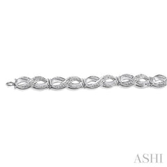 1/20 Ctw Swirl Shape Round Cut Diamond Bracelet in Sterling Silver