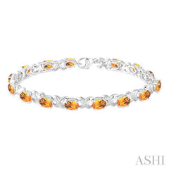 7x5 MM Oval Cut Citrine and 1/20 Ctw Round Cut Diamond Fashion Bracelet in Sterling Silver