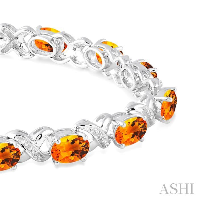 7x5 MM Oval Cut Citrine and 1/20 Ctw Round Cut Diamond Fashion Bracelet in Sterling Silver