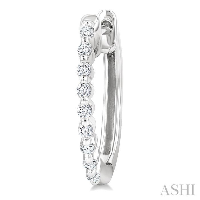 1/6 Ctw Petite Shared Prong Round Cut Diamond Hoop Earring in Sterling Silver