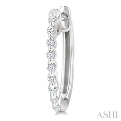 1/6 Ctw Petite Shared Prong Round Cut Diamond Hoop Earring in Sterling Silver
