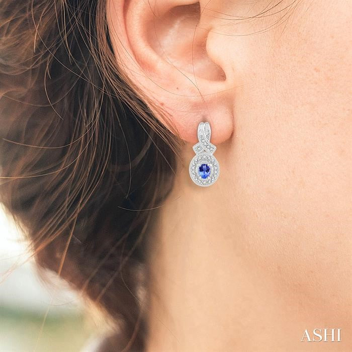 4x3 MM Oval Cut Tanzanite and 1/20 Ctw Round Cut Diamond Earrings in Sterling Silver