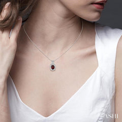 9x7 MM Oval Cut Garnet and 1/50 Ctw Round Cut Diamond Pendant in Sterling Silver with Chain