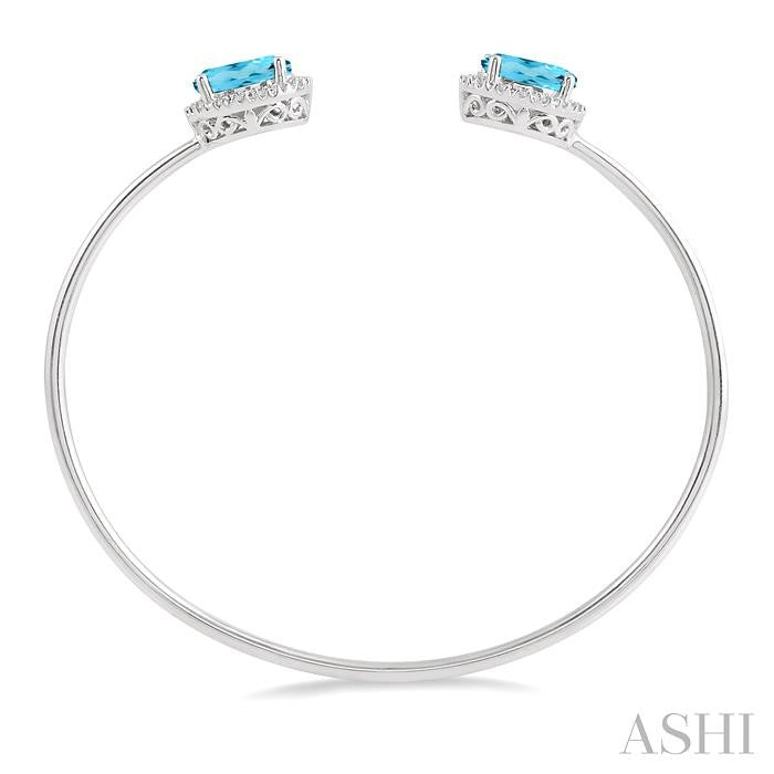 9x7 MM Oval Shape Blue Topaz and 1/10 Ctw Round Cut Diamond Bangle in Sterling Silver