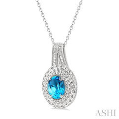 8x6 MM Oval Cut Blue Topaz and 1/20 Ctw Round Cut Diamond Semi-Precious Pendant With Chain in Sterling Silver