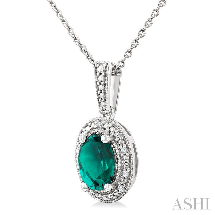 7X5 MM Oval Shape Lab-Created Emerald and 1/50 Ctw Round Cut Diamond Precious Pendant With Chain in Sterling Silver 