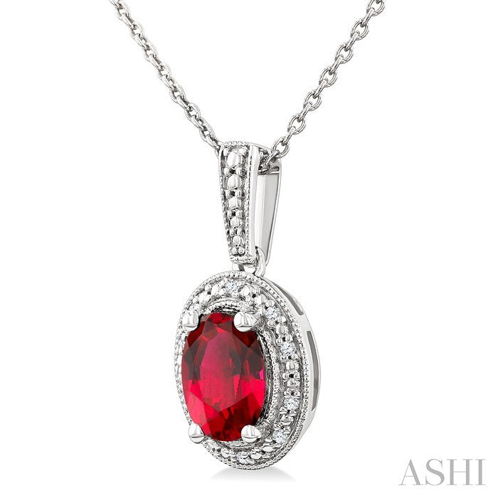 7X5 MM Oval Shape Lab-Created Ruby and 1/50 Ctw Round Cut Diamond Precious Pendant With Chain in Sterling Silver 