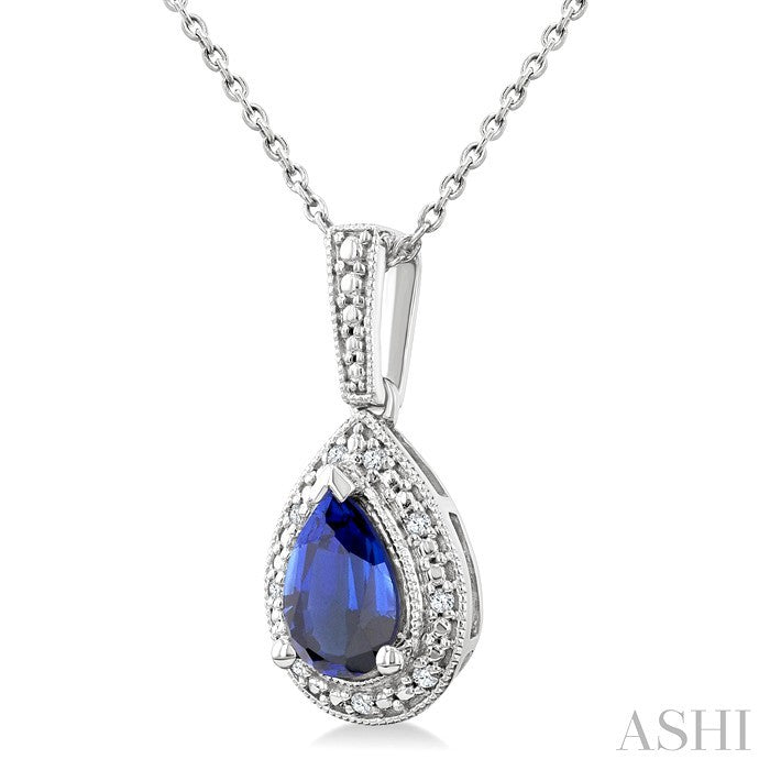 7X5 MM Pear Shape Lab-Created Sapphire and 1/50 Ctw Round Cut Diamond Precious Pendant With Chain in Sterling Silver 