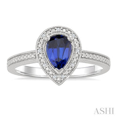 7X5 MM Pear Shape Lab-Created Sapphire and 1/50 Ctw Round Cut Diamond Precious Ring in Sterling Silver 