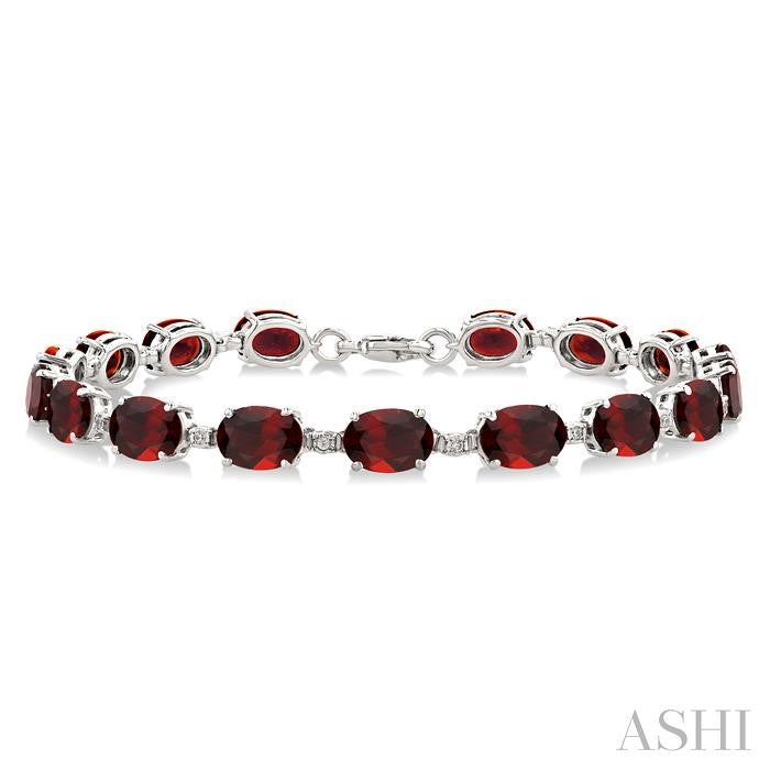 7X5 MM Oval Shape Garnet and 1/10 Ctw Round Cut Diamond Semi-Precious Bracelet in Sterling Silver