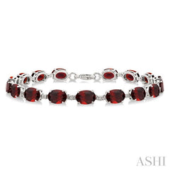 7X5 MM Oval Shape Garnet and 1/10 Ctw Round Cut Diamond Semi-Precious Bracelet in Sterling Silver