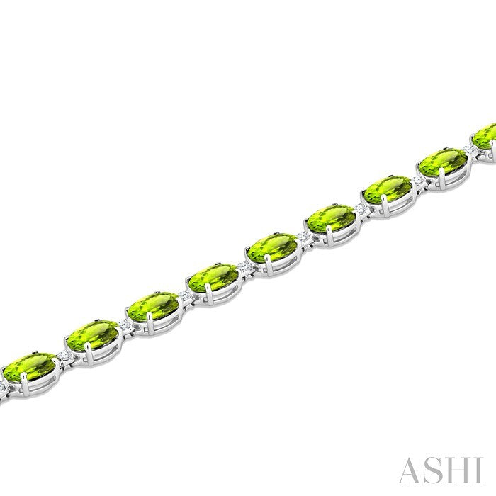 7X5 MM Oval Shape Peridot and 1/10 Ctw Round Cut Diamond Semi-Precious Bracelet in Sterling Silver