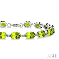7X5 MM Oval Shape Peridot and 1/10 Ctw Round Cut Diamond Semi-Precious Bracelet in Sterling Silver