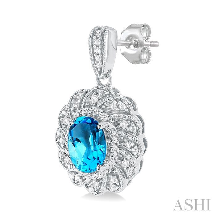 7X5 MM Oval Cut Blue Topaz and 1/20 Ctw Round Cut Diamond Semi-Precious Earring in Sterling Silver