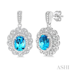 7X5 MM Oval Cut Blue Topaz and 1/20 Ctw Round Cut Diamond Semi-Precious Earring in Sterling Silver