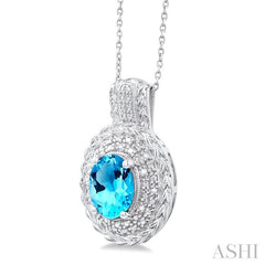 9X7 MM Oval Cut Blue Topaz and 1/20 Ctw Round Cut Diamond Semi-Precious Pendant With Chain in Sterling Silver