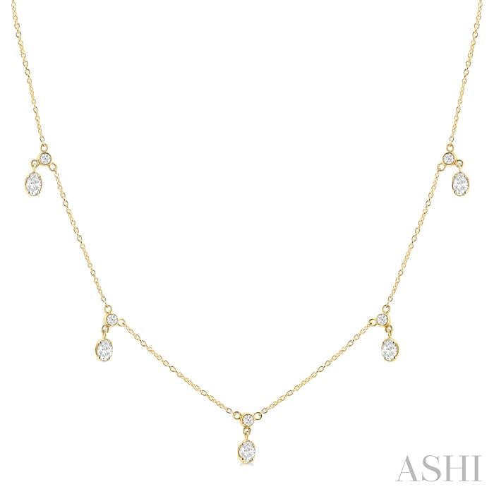 5/8 Ctw Dangle Oval and Round Cut Diamond Station Necklace in 14K Yellow Gold