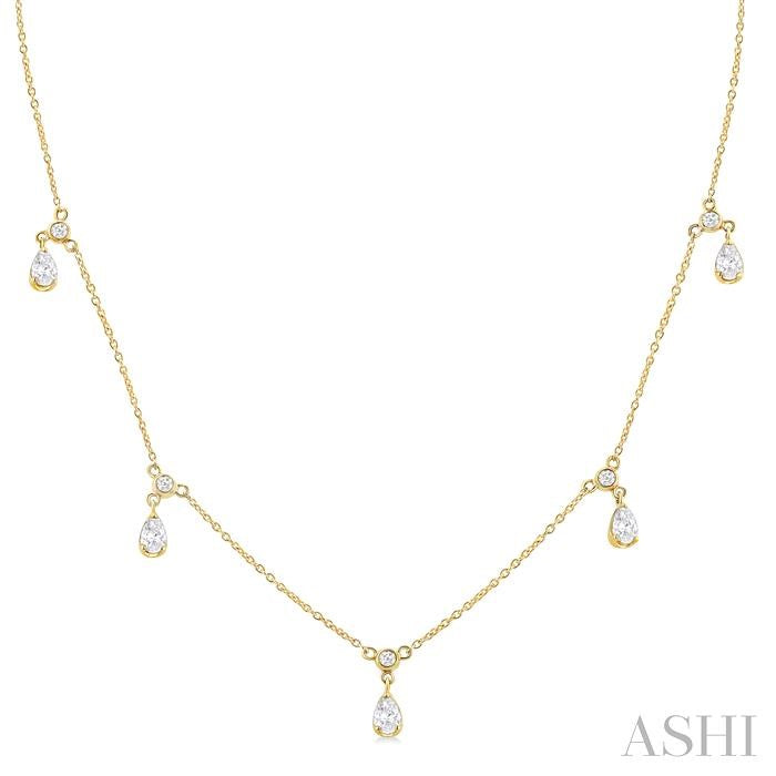 5/8 Ctw Dangle Pear and Round Cut Diamond Station Necklace in 14K Yellow Gold