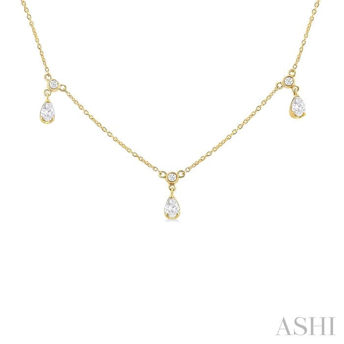 5/8 Ctw Dangle Pear and Round Cut Diamond Station Necklace in 14K Yellow Gold