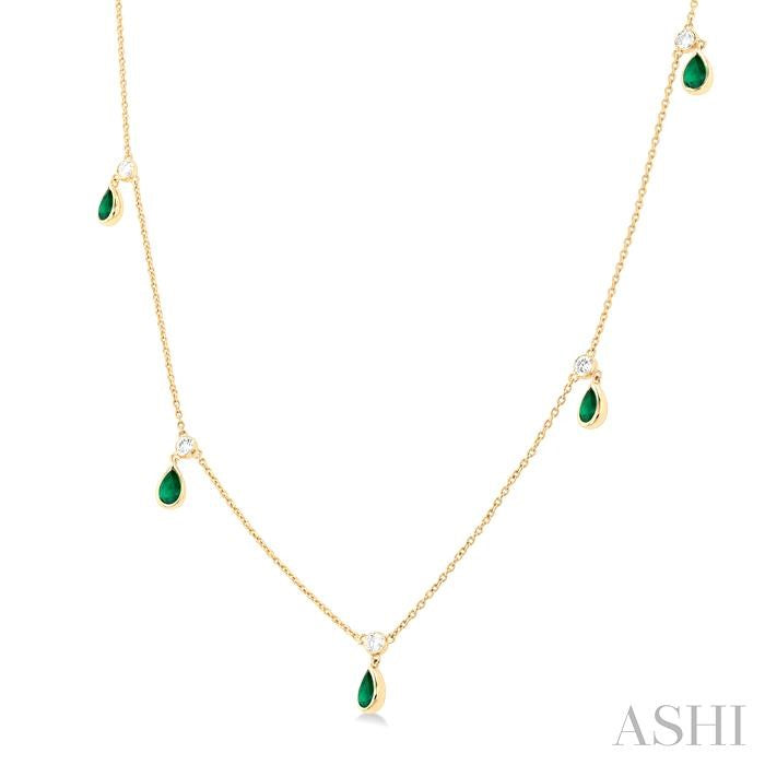 5x3 MM Pear Shape Emerald and 1/4 Ctw Round Cut Diamonds Precious Station Necklace in 10K Yellow Gold