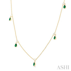 5x3 MM Pear Shape Emerald and 1/4 Ctw Round Cut Diamonds Precious Station Necklace in 10K Yellow Gold