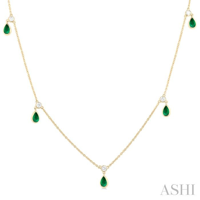 5x3 MM Pear Shape Emerald and 1/4 Ctw Round Cut Diamonds Precious Station Necklace in 10K Yellow Gold