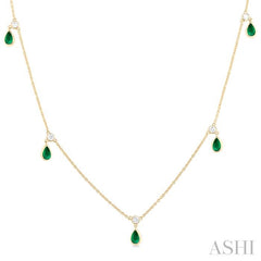 5x3 MM Pear Shape Emerald and 1/4 Ctw Round Cut Diamonds Precious Station Necklace in 10K Yellow Gold